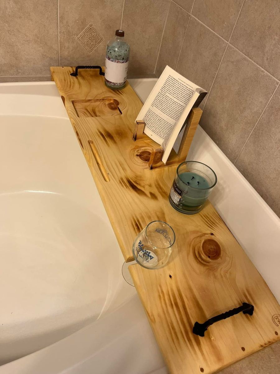 Torched pine bath caddy with a book stand and wine glass slot